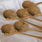 Luxury gold dessert spoon set with beautiful daisy flower design