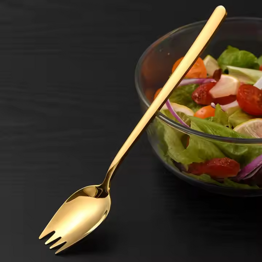 gold stainless steel spork set with elegant bird-shaped spoon rest displayed on a wooden serving tray.