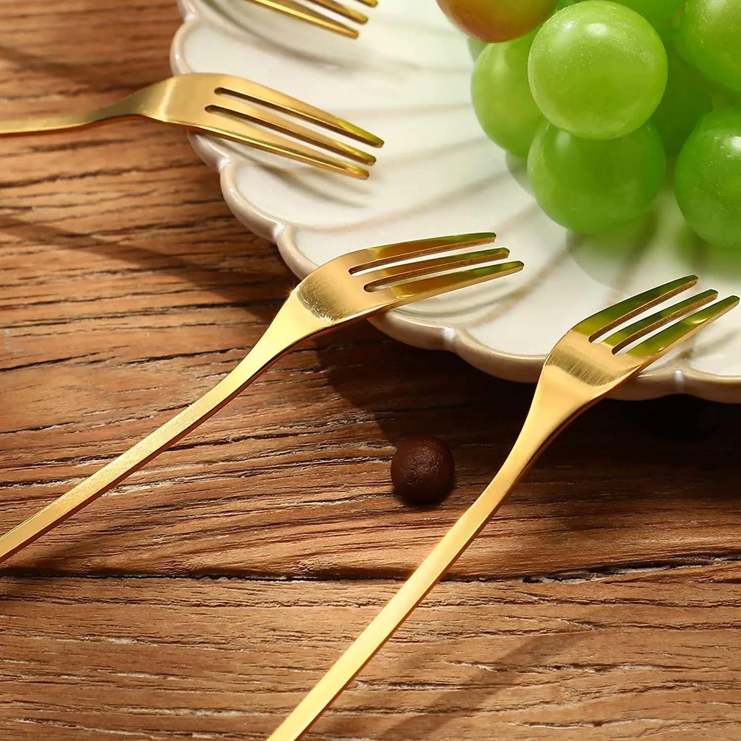 Gold leaf design fruit forks made from premium stainless steel for elegant dining