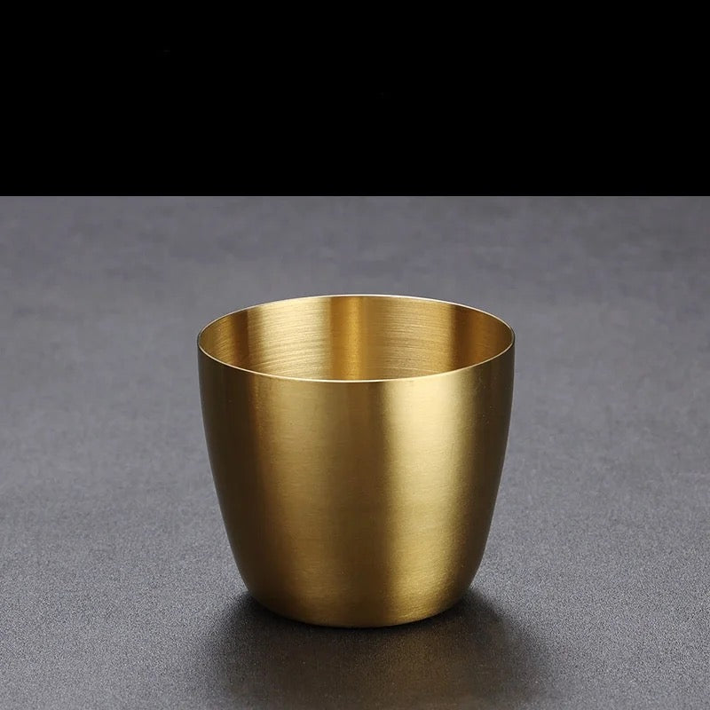 Gold cup on a gray background