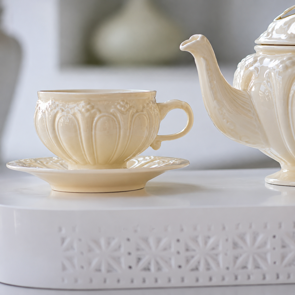 Off-white porcelain tea cup and saucer for tea, coffee and cappuccino