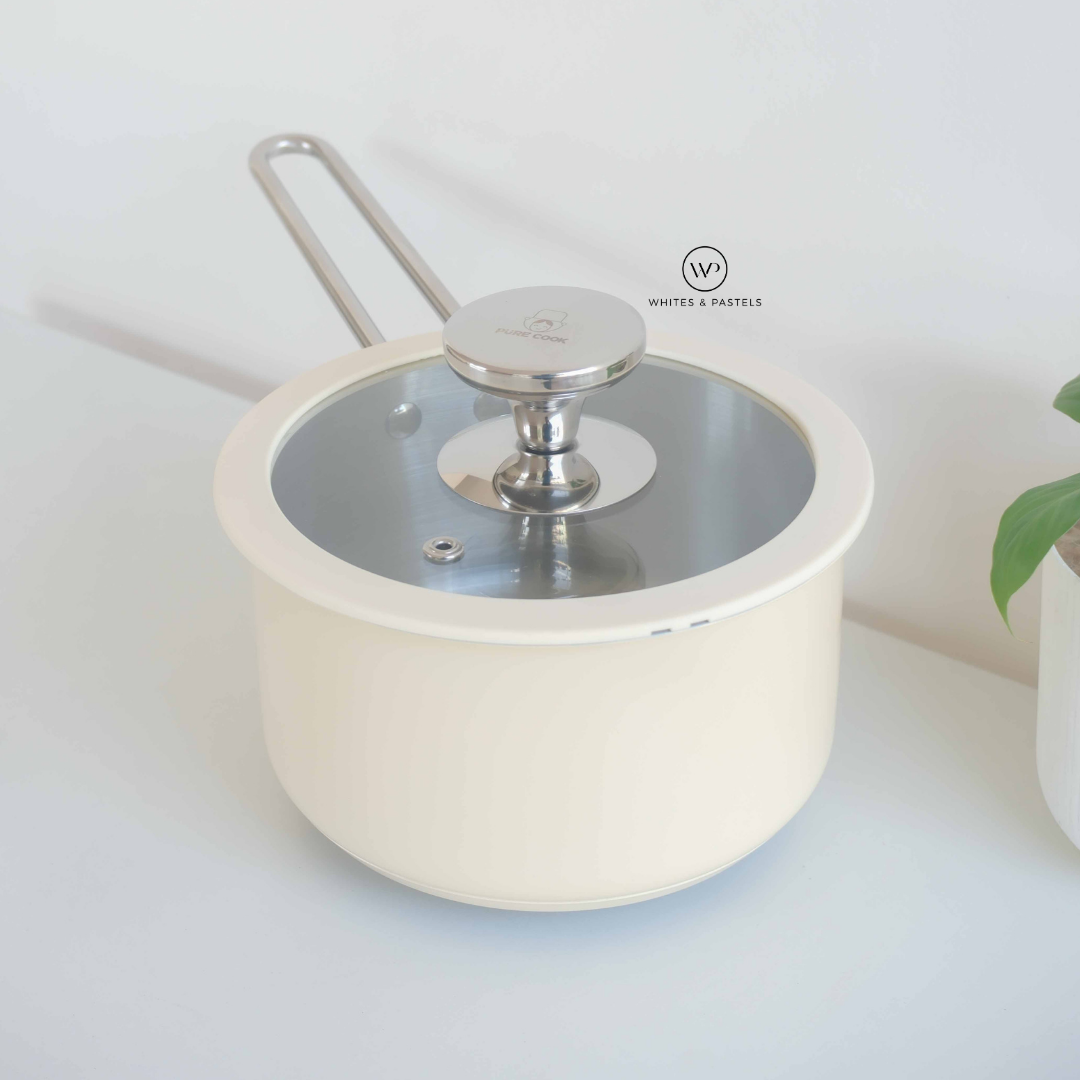 Ceramic coated pots and pans with stainless steel interior