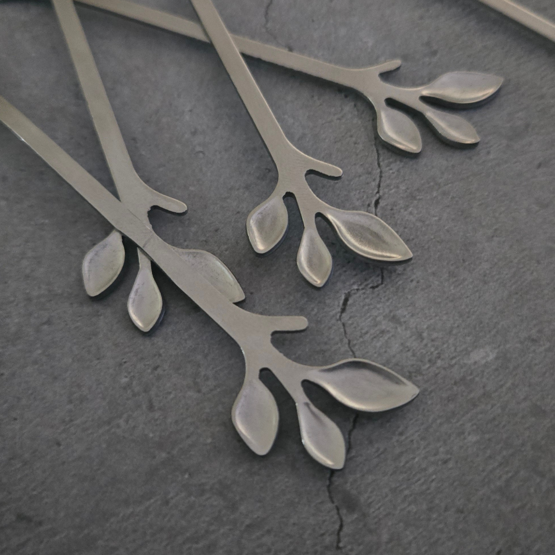 Modern stainless steel leaf design forks for premium dining and entertaining