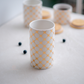 Ceramic cookie jar set with natural wooden lids