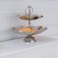 Elegant hammered silver serving stand for afternoon tea and celebrations.