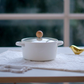 White ceramic serving dish with stylish wooden lid handle