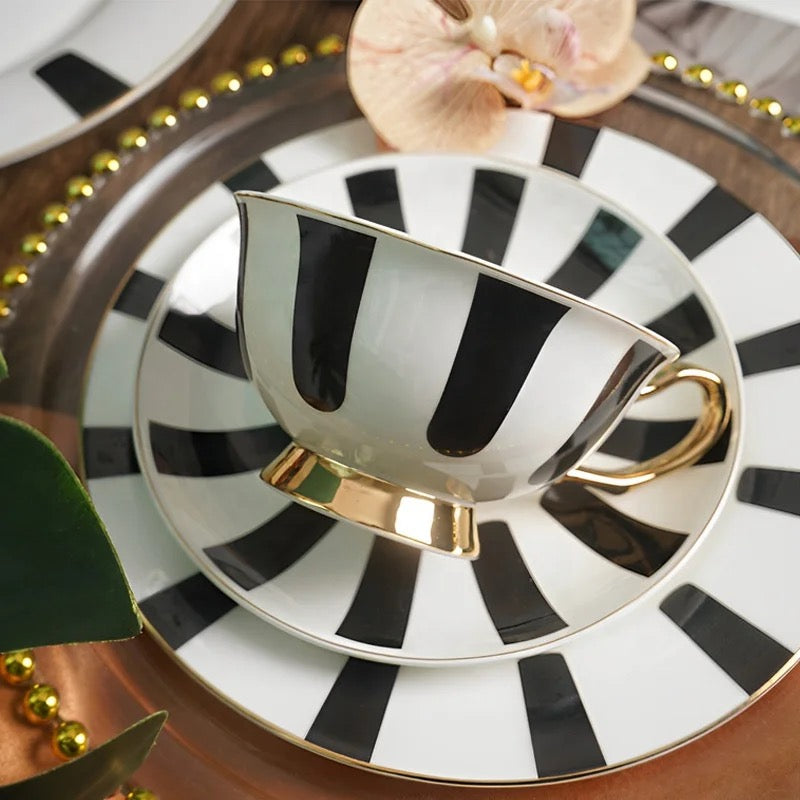 Premium black and white striped porcelain tea set with elegant floral gift presentation.
