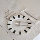 Set of 5 pc Silver Cutlery Set placed on Dining table on white runner
