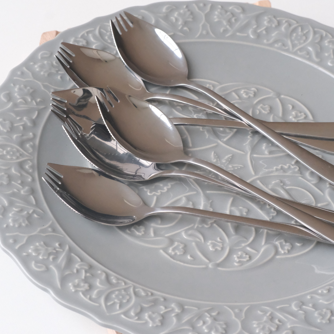 Luxury gold dessert sporks featuring a mirror finish and decorative bird spoon holder for stylish table settings.