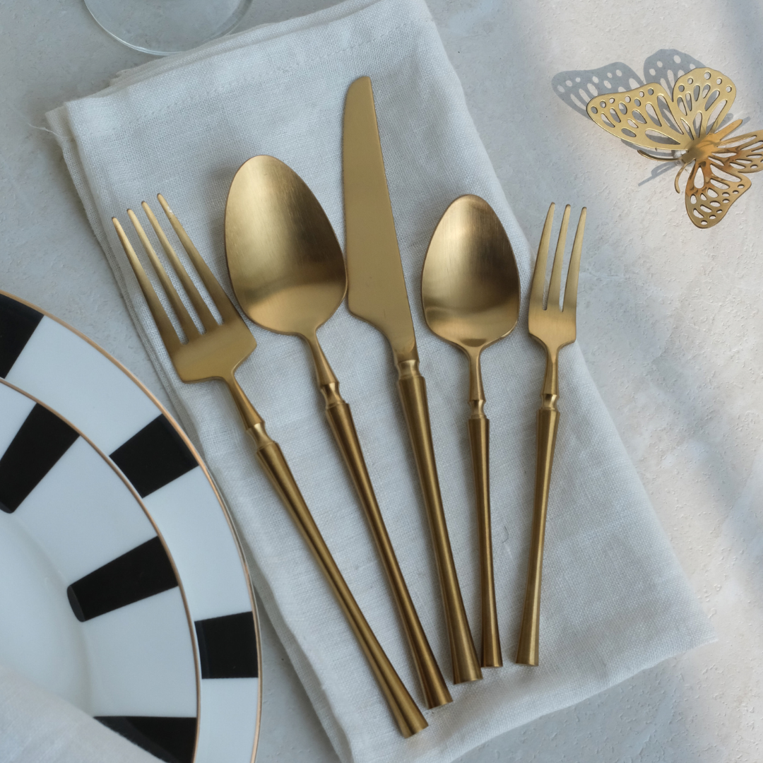 elegant gold-tone stainless steel cutlery set with a refined matte satin finish for luxurious dining experiences
