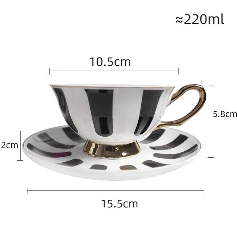 Sophisticated black and white striped tea cup and saucer set perfect for tea lovers and gifting.