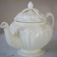 Beautiful Victorian porcelain tea pot in ivory finish for tea lovers who appreciate fine craftsmanship.