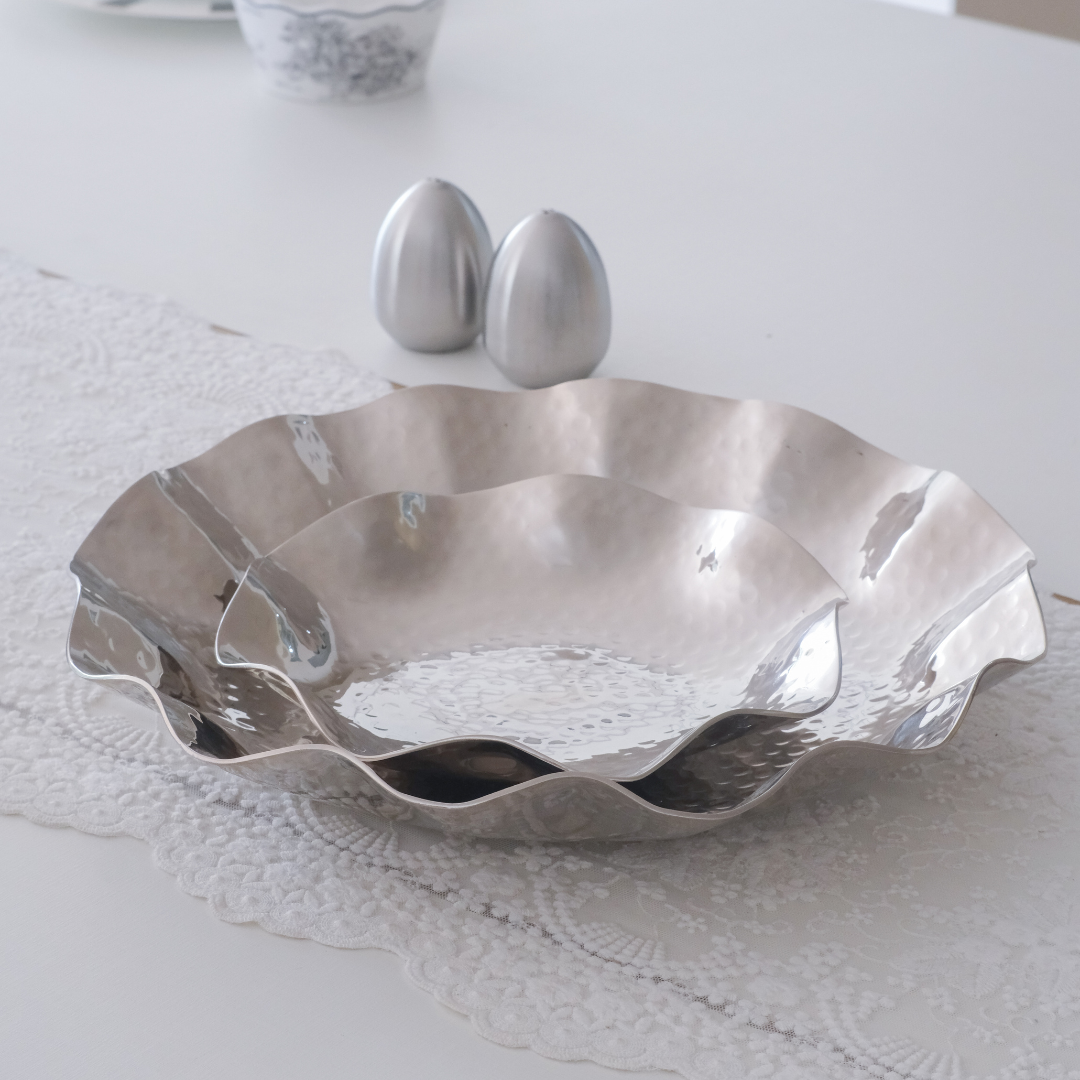 Hammered silver decorative trays for dining and tabletop décor.