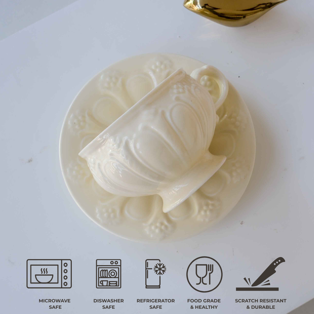 Ivory porcelain tea cup and saucer gift set with intricate embossed craftsmanship