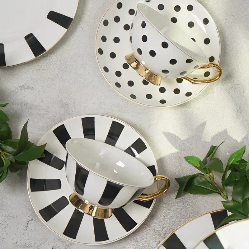 Premium black and white porcelain tea set in a decorative floral gift box, ideal for gifting.