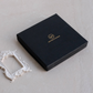 Black gift box with Whites & Pastels branding