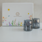 Six black glass tumblers presented in a luxury Whites & Pastels floral gift box