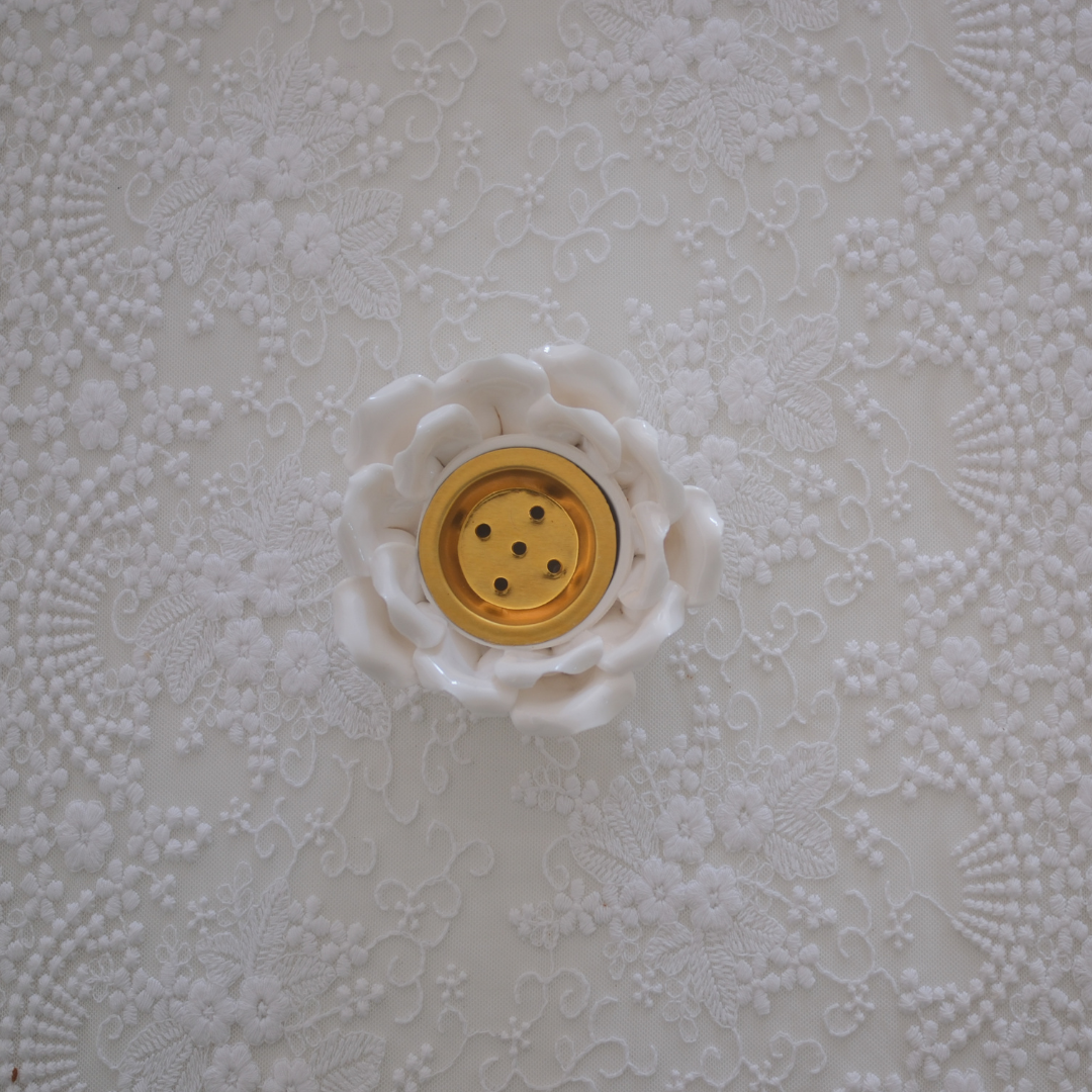 Minimalist white ceramic lotus décor for contemporary interiors