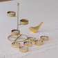 Minimalist gold candle holder set designed for standard tea light candles