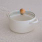 Premium white ceramic serving bowl with clear glass lid and wooden handle, perfect for serving hot meals, soups, dals and casseroles while retaining heat.