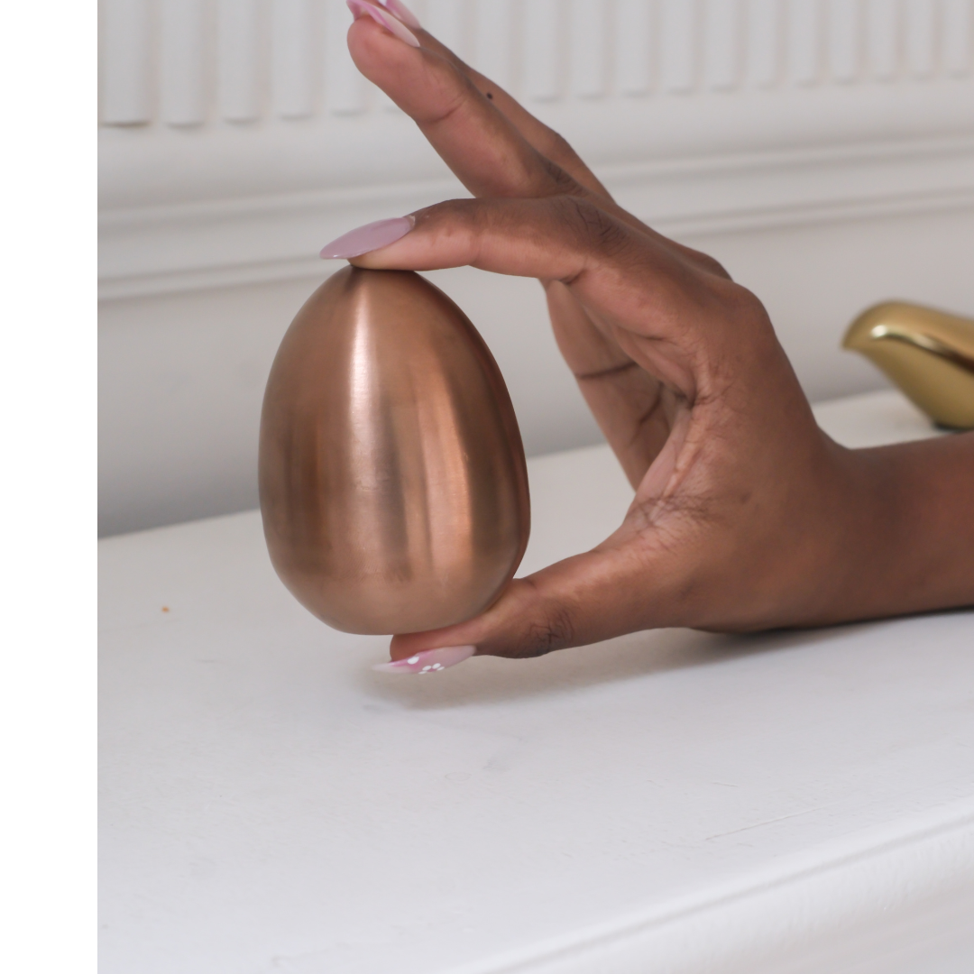Luxury dining table accessory with metallic salt and pepper dispenser set.