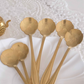 Gold dessert spoon set with floral engraved detailing