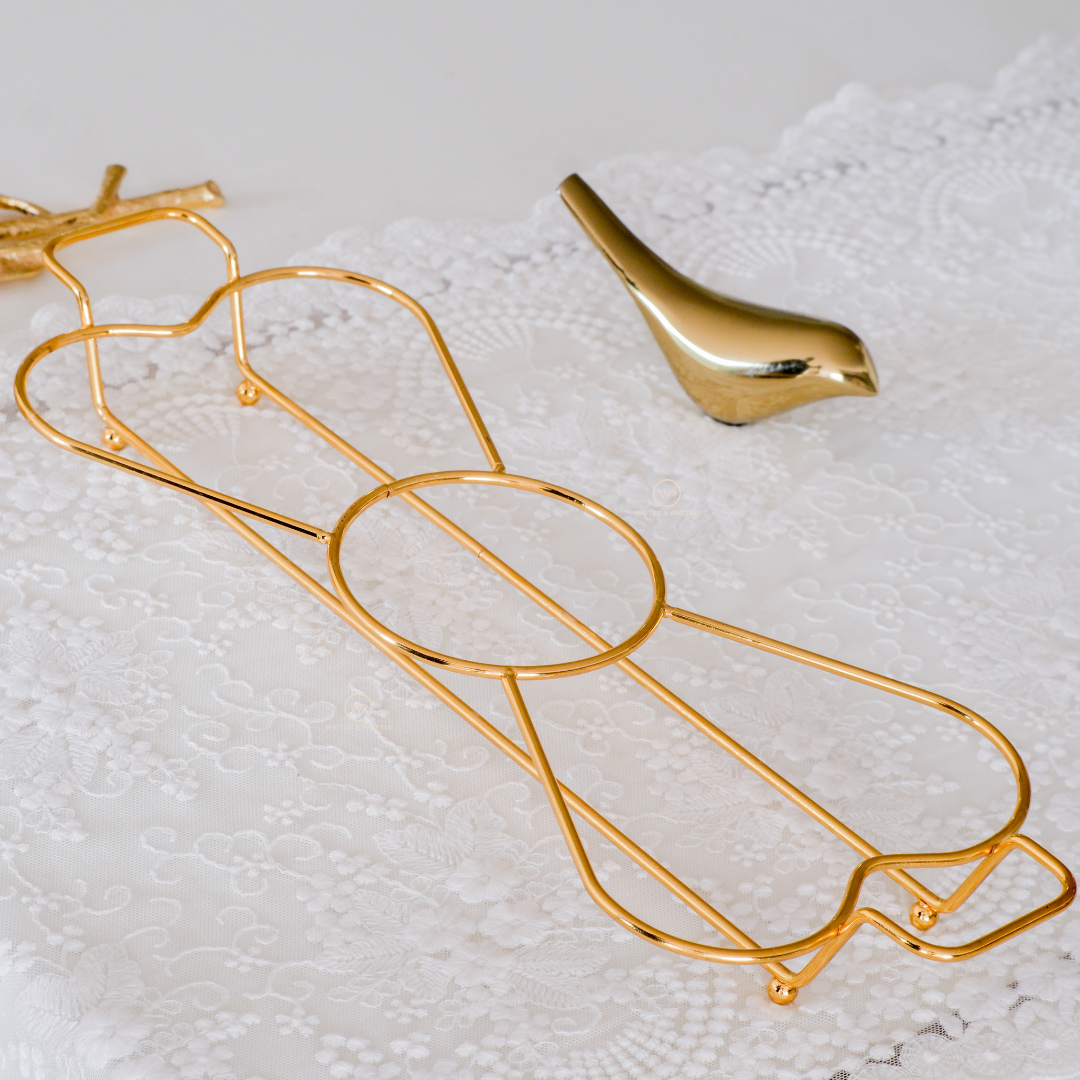 Luxury serveware with heart bowls and gold metal frame.