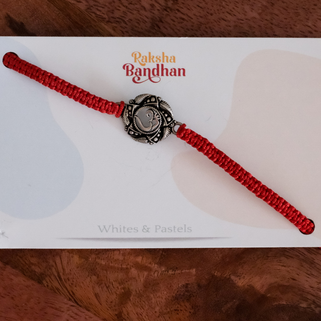 Beaded Om  Silver Raakhi