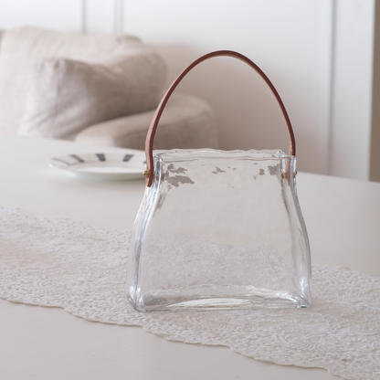 Premium  Transparent hammered glass drink dispenser with leather strap for stylish entertaining.