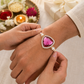 Sister tying Rakhi to Brother