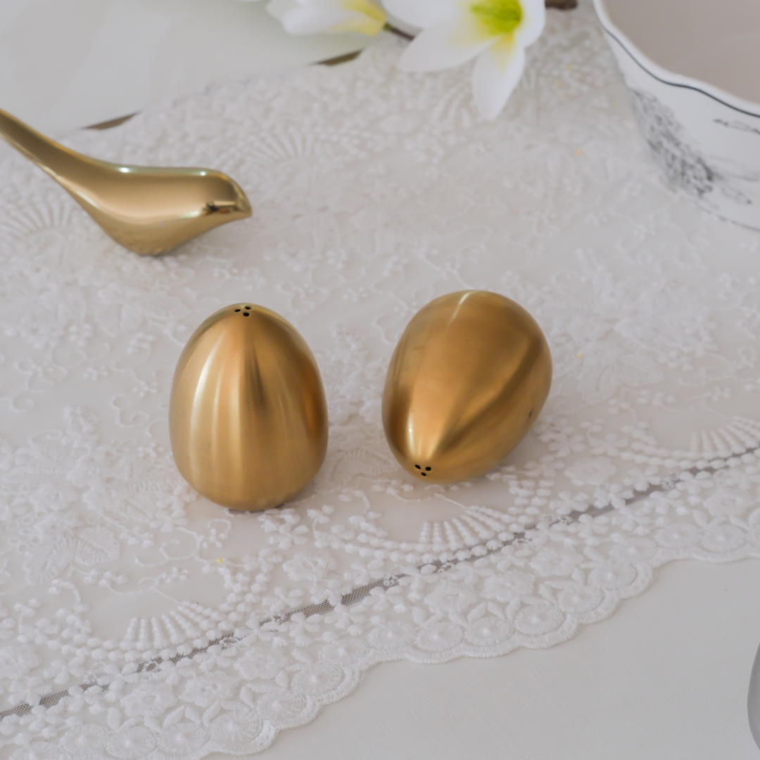 Luxury home entertaining essentials with decorative shaker set. Gold