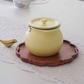 Elegant ceramic ghee storage jars with airtight lids for modern Indian kitchens.