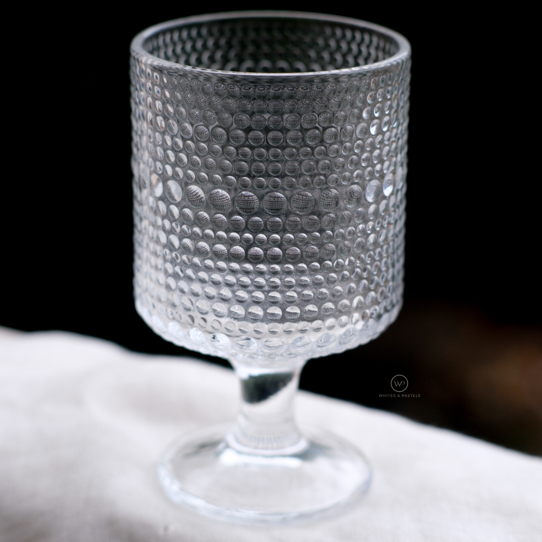Elegant clear glass juice glasses with textured bubble design