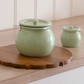 Elegant ceramic ghee container for modern kitchen countertops.