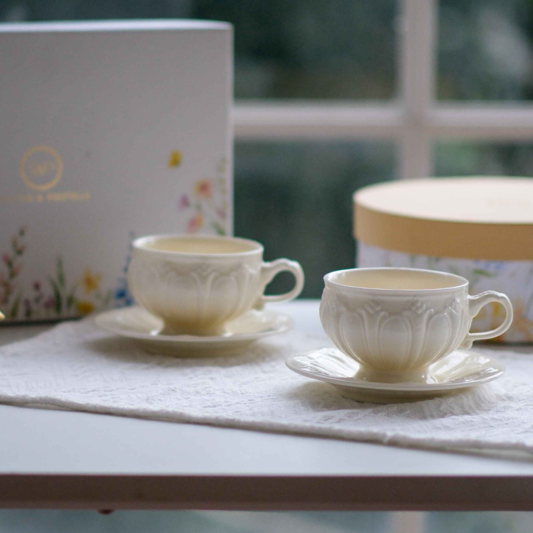 Luxury porcelain tea cup set with embossed Victorian design in an elegant floral gift hamper.
