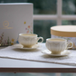 Luxury porcelain tea cup set with embossed Victorian design in an elegant floral gift hamper.