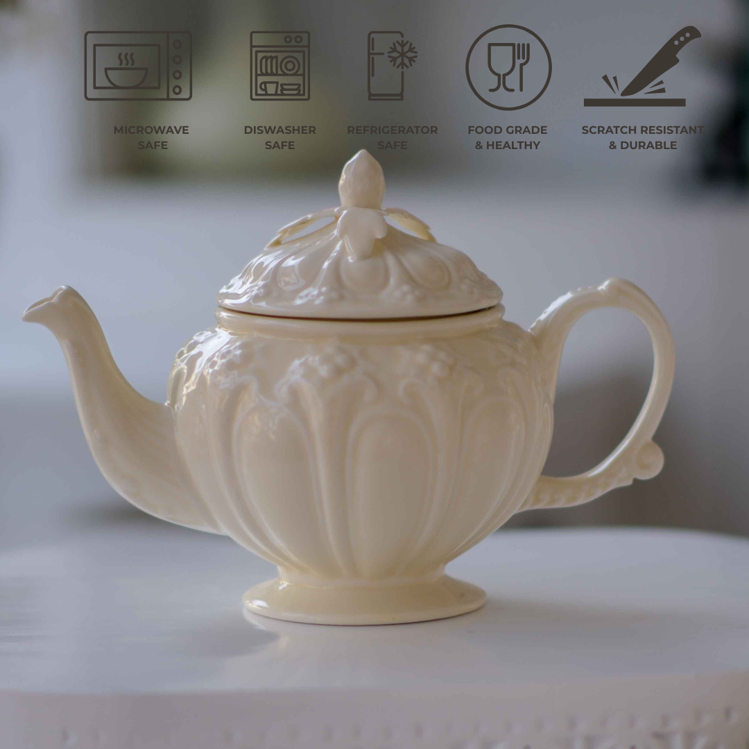 
Victorian embossed ivory tea pot crafted from premium porcelain, perfect for luxury high tea gatherings.