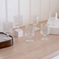 Clear fluted drinking glasses with stemmed design