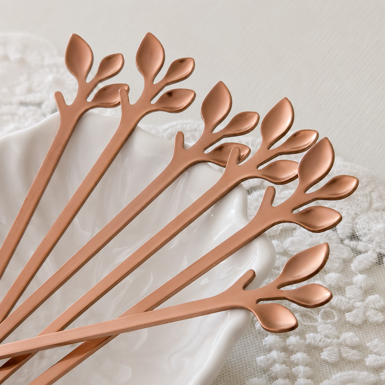 Premium rose gold leaf-shaped stainless steel dessert forks for elegant dining