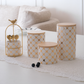 White ceramic kitchen storage containers with gold design