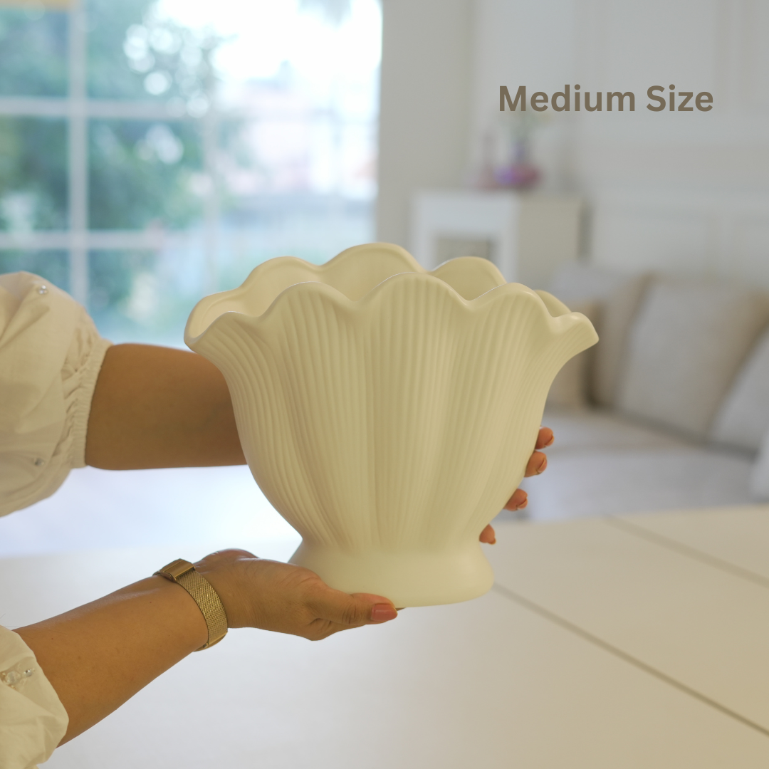 Shell-inspired decorative vases for table, shelf, and centerpiece styling