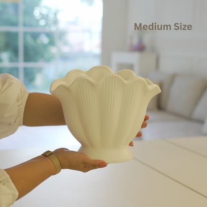 Shell-inspired decorative vases for table, shelf, and centerpiece styling