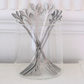Premium silver appetizer forks featuring a nature-inspired leaf handle design.