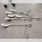 Silver stainless steel espresso spoon set perfect for coffee lovers and elegant table settings.