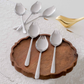 Contemporary matte Silver spoon fork combination made from durable stainless steel.