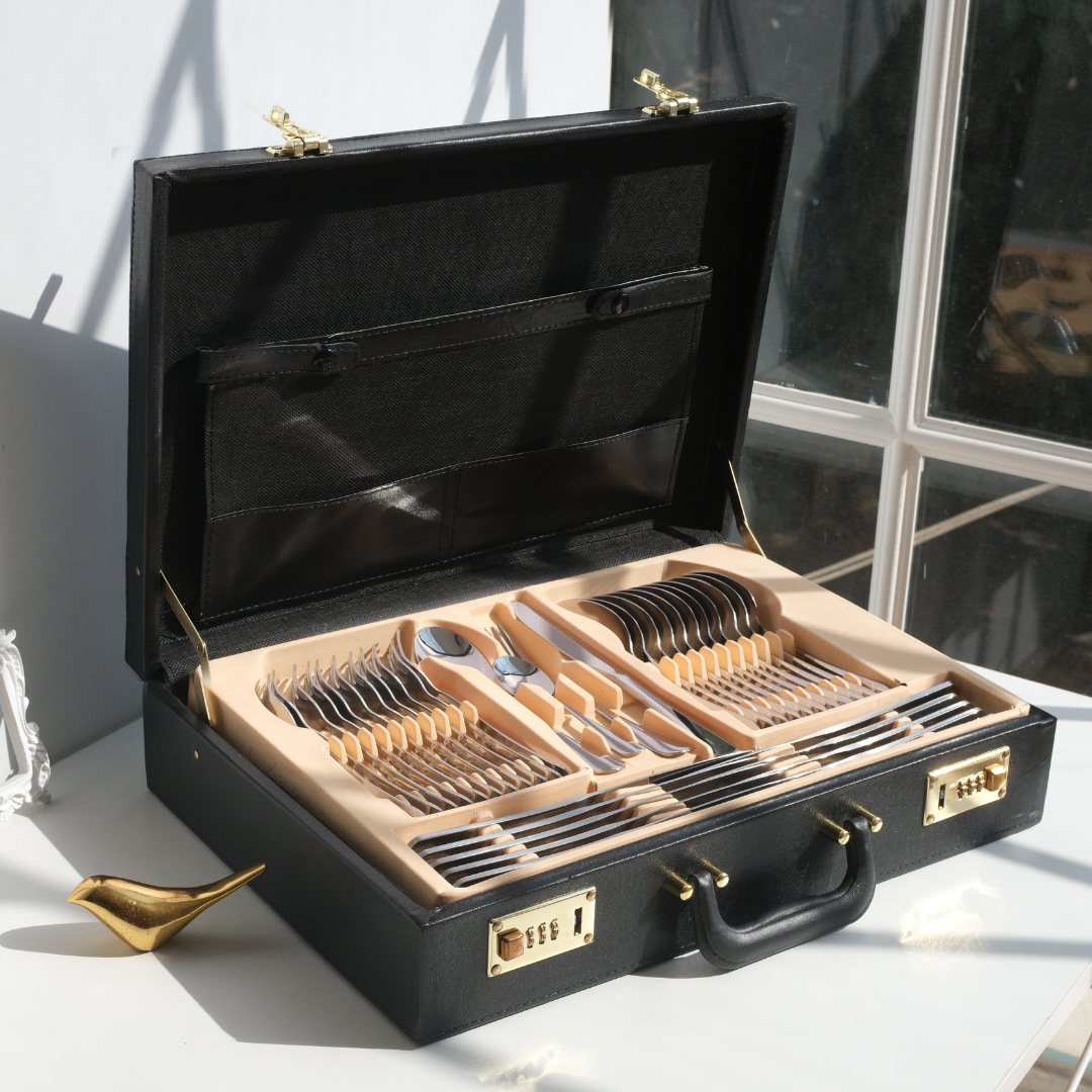 Silver Cutlery set placed in a faux leather suitcase