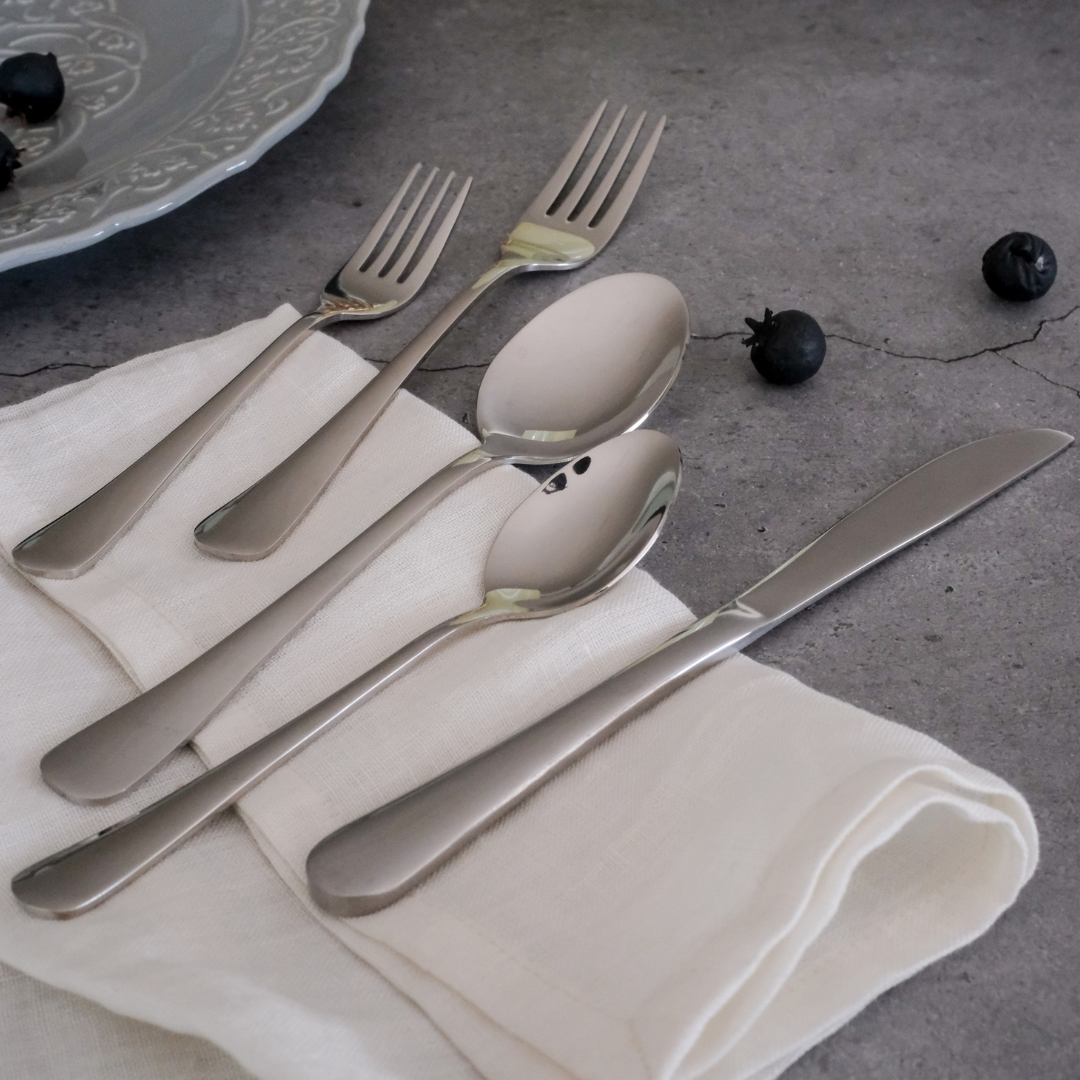 stainless steel dining cutlery set with polished spoon, fork and knife for elegant everyday meals.