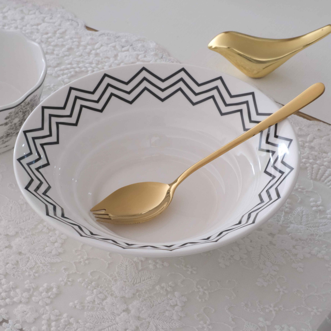 Modern gold spork perfect for enjoying salads, noodles, pasta and desserts.
