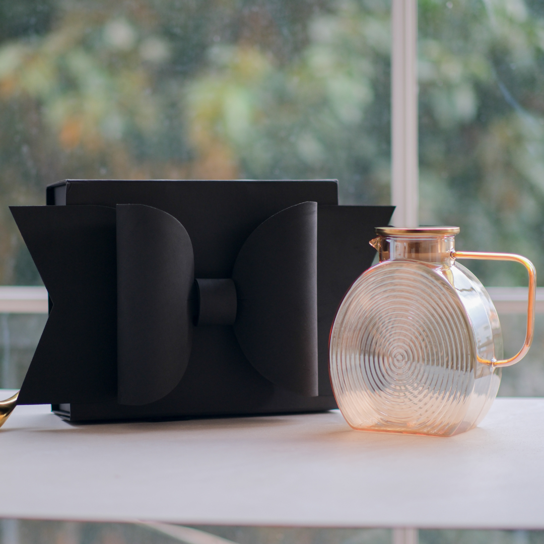 Textured brown glass jug with circular ribbed design, gold lid and elegant matching handle in Gift Box