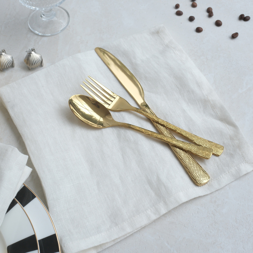 Textured gold SS304 dinner cutlery set with spoon, fork, and knife for everyday dining and special occasions.